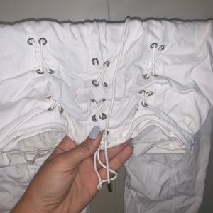 Fun white lace up pants